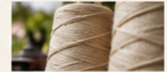 Natural cotton yarn spools